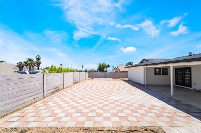 view of patio with a fenced backyard
