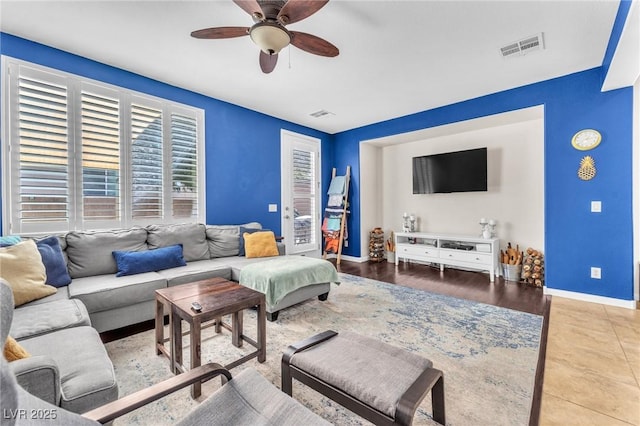 10353 Settlers Run Ave, Las Vegas, NV 89166 - living area featuring a ceiling fan and baseboards