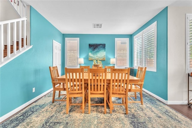 10353 Settlers Run Ave, Las Vegas, NV 89166 - dining room featuring baseboards and wood finished floors