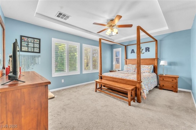 10353 Settlers Run Ave, Las Vegas, NV 89166 - bedroom with a tray ceiling, baseboards, and carpet floors