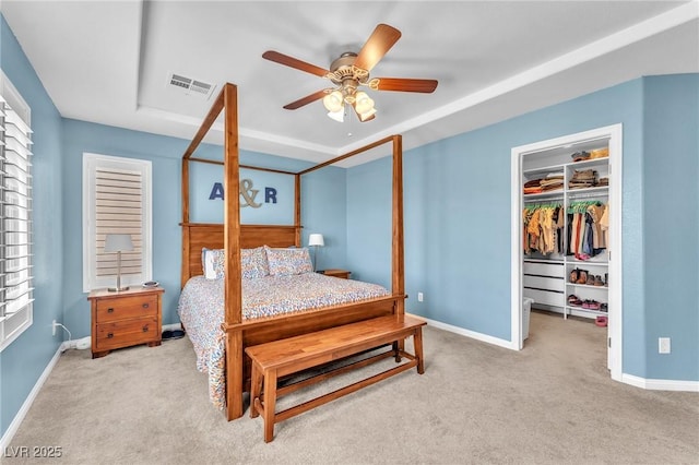 10353 Settlers Run Ave, Las Vegas, NV 89166 - bedroom with a spacious closet, light colored carpet, and baseboards