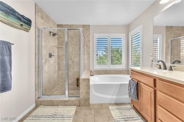 10353 Settlers Run Ave, Las Vegas, NV 89166 - full bath featuring vanity, a garden tub, a shower stall, and tile patterned flooring