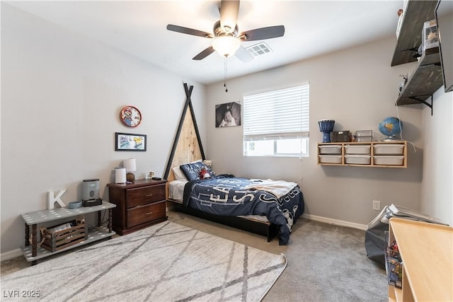 carpeted bedroom featuring baseboards and ceiling fan