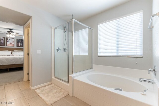 full bath featuring a shower stall, connected bathroom, a garden tub, and a ceiling fan