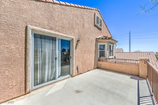 view of patio / terrace featuring a balcony