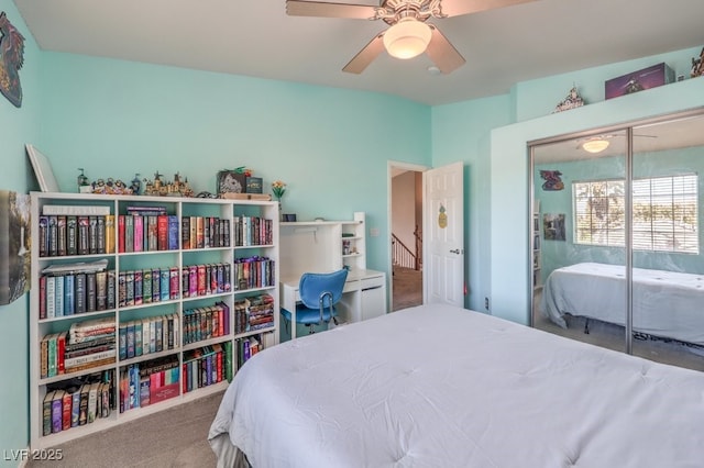 bedroom with carpet and a ceiling fan