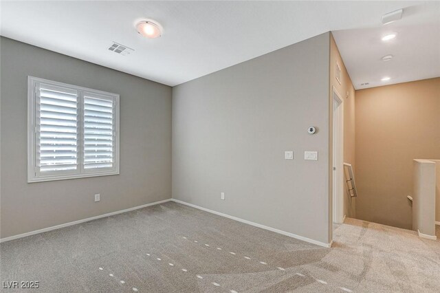 8562 Insignia Ave Unit 102, Las Vegas, NV 89178 - spare room featuring carpet floors and baseboards