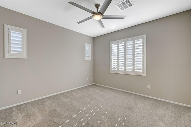 8562 Insignia Ave Unit 102, Las Vegas, NV 89178 - carpeted spare room featuring healthy amount of natural light, a ceiling fan, and baseboards