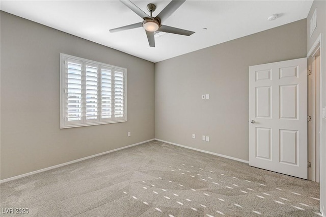 8562 Insignia Ave Unit 102, Las Vegas, NV 89178 - carpeted spare room with ceiling fan, baseboards, and a smoke detector