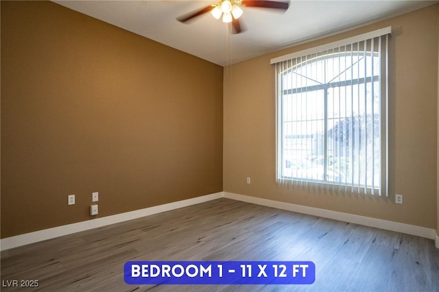 9710 Geiger Peak Ct, Las Vegas, NV 89148 - unfurnished room featuring plenty of natural light, wood finished floors, a ceiling fan, and baseboards