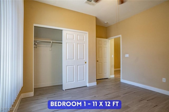 9710 Geiger Peak Ct, Las Vegas, NV 89148 - unfurnished bedroom featuring wood finished floors, a closet, and baseboards