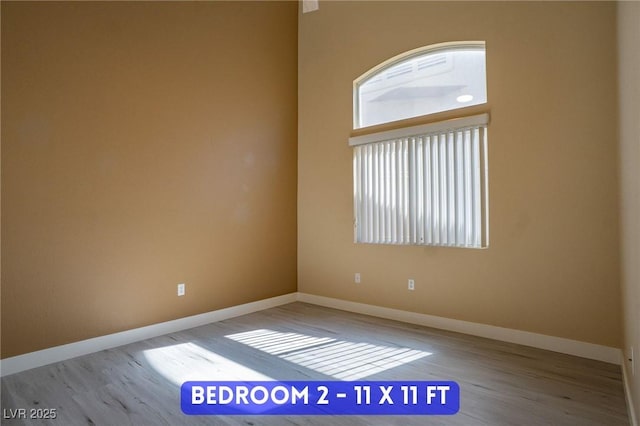 9710 Geiger Peak Ct, Las Vegas, NV 89148 - spare room with wood finished floors and baseboards