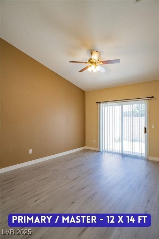 9710 Geiger Peak Ct, Las Vegas, NV 89148 - spare room featuring a ceiling fan, wood finished floors, baseboards, and lofted ceiling