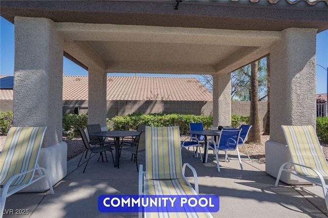 9710 Geiger Peak Ct, Las Vegas, NV 89148 - view of patio featuring outdoor dining space and a fenced backyard