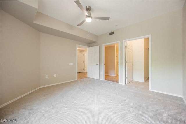 6868 Sky Pointe Dr Unit 1112, Las Vegas, NV 89131 - unfurnished bedroom with light colored carpet, baseboards, and ceiling fan