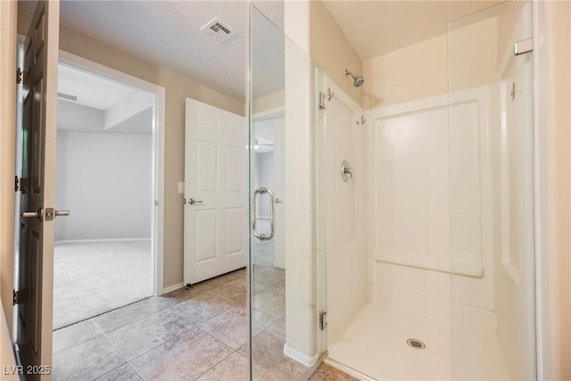 6868 Sky Pointe Dr Unit 1112, Las Vegas, NV 89131 - full bathroom featuring a shower stall, tile patterned flooring, and baseboards