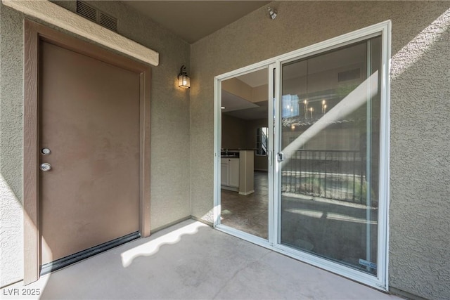 6868 Sky Pointe Dr Unit 1112, Las Vegas, NV 89131 - view of exterior entry with stucco siding