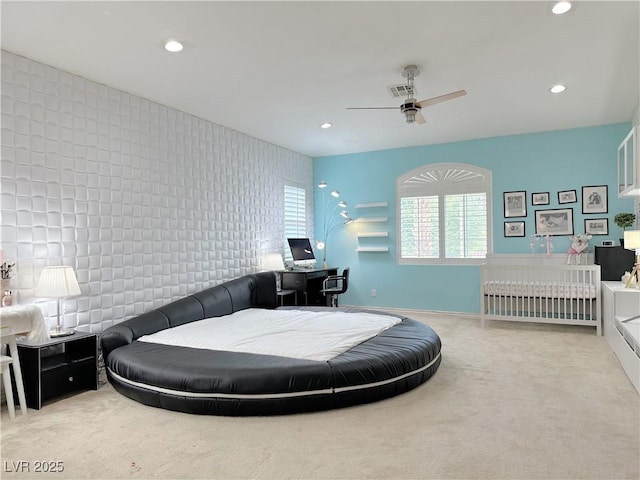 2451 Tour Edition Dr, Henderson, NV 89074 - carpeted bedroom with recessed lighting, an office area, an accent wall, ceiling fan, and baseboards