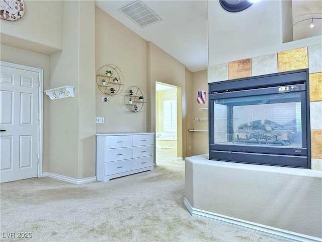 2451 Tour Edition Dr, Henderson, NV 89074 - hall featuring carpet flooring, baseboards, and lofted ceiling