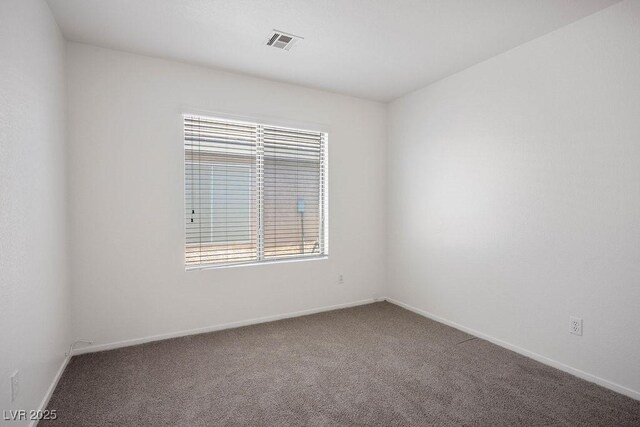 7755 Pacific Rim Ct, Las Vegas, NV 89139 - empty room with carpet floors and baseboards