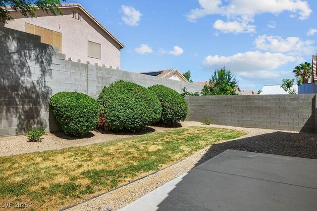 7755 Pacific Rim Ct, Las Vegas, NV 89139 - fenced backyard featuring a patio area