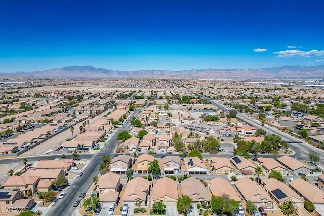 7755 Pacific Rim Ct, Las Vegas, NV 89139 - aerial overview of property's location with nearby suburban area and mountains