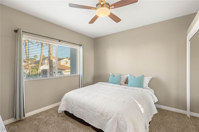 8100 Lake Hills Dr, Las Vegas, NV 89128 - carpeted bedroom featuring baseboards and a ceiling fan