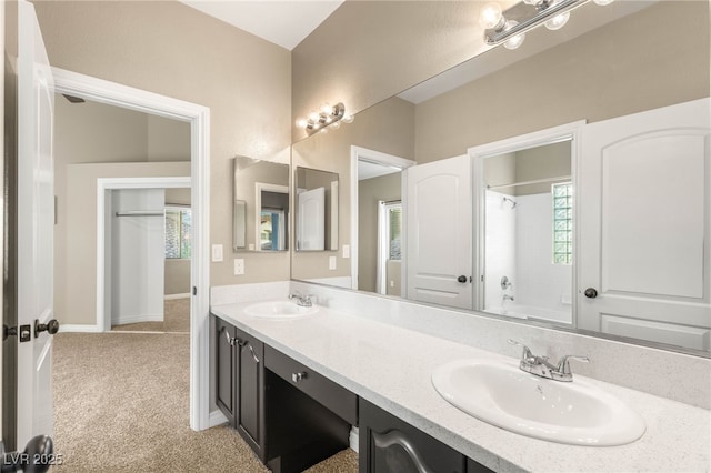 8100 Lake Hills Dr, Las Vegas, NV 89128 - full bath featuring double vanity, bathtub / shower combination, and baseboards