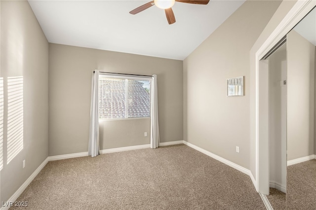 8100 Lake Hills Dr, Las Vegas, NV 89128 - empty room with light carpet, a ceiling fan, baseboards, and vaulted ceiling