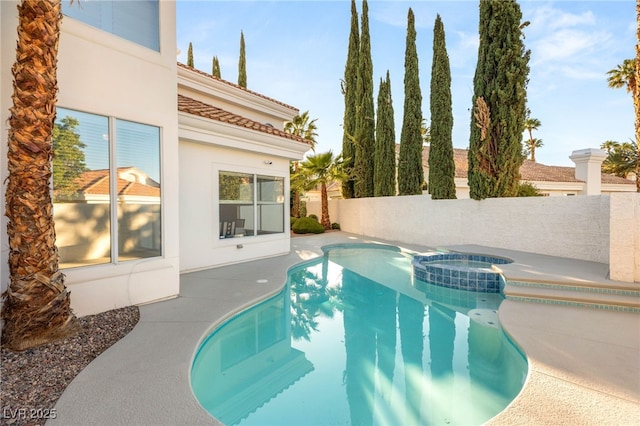 8100 Lake Hills Dr, Las Vegas, NV 89128 - view of swimming pool featuring a pool with connected hot tub and a patio area