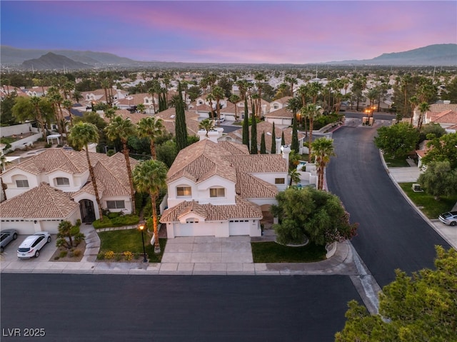 8100 Lake Hills Dr, Las Vegas, NV 89128 - aerial view at dusk of a residential view and a mountain view