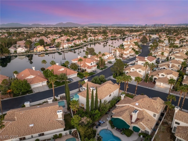 8100 Lake Hills Dr, Las Vegas, NV 89128 - aerial view at dusk of a residential view and a water and mountain view