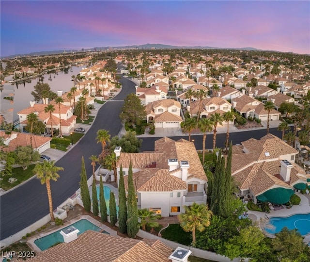 8100 Lake Hills Dr, Las Vegas, NV 89128 - aerial view at dusk of view of pool area, a residential view, and a water view