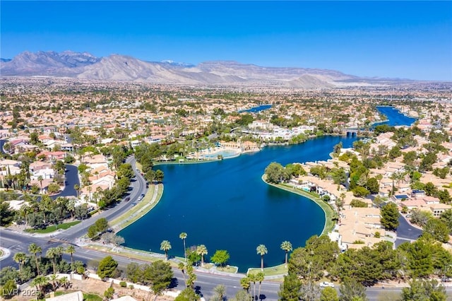 8100 Lake Hills Dr, Las Vegas, NV 89128 - aerial overview of property's location with a water and mountain view and nearby suburban area