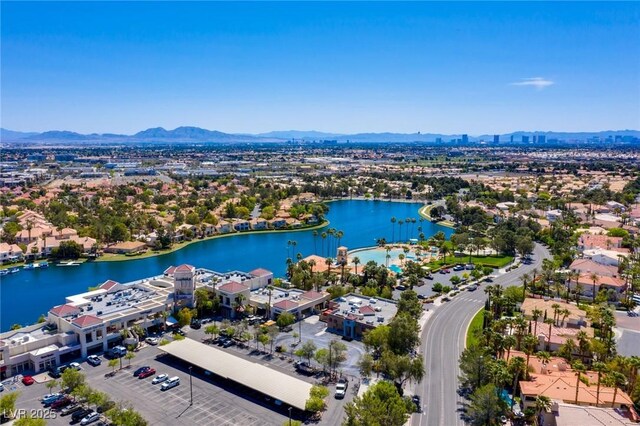 8100 Lake Hills Dr, Las Vegas, NV 89128 - aerial perspective of suburban area with a water and mountain view
