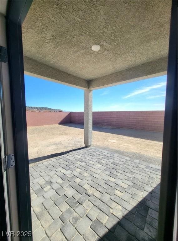 view of patio with a fenced backyard