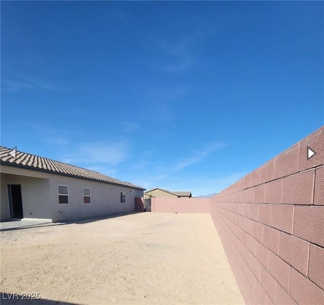 view of yard with fence