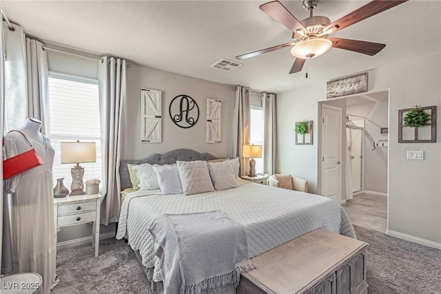 bedroom with carpet flooring, baseboards, and ceiling fan