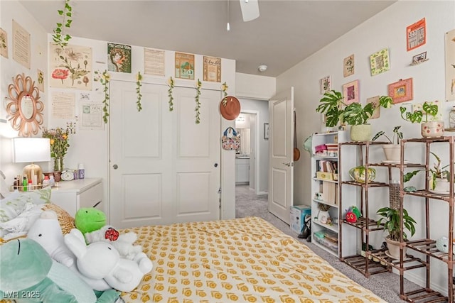 bedroom with carpet floors, a closet, and ceiling fan