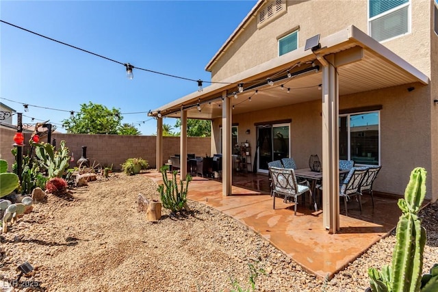 view of patio / terrace with fence