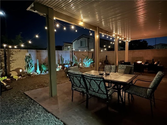 view of patio / terrace with outdoor dining area and a fenced backyard