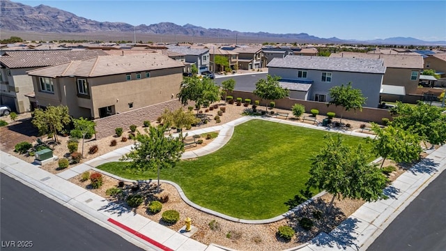 aerial perspective of suburban area with a mountain backdrop