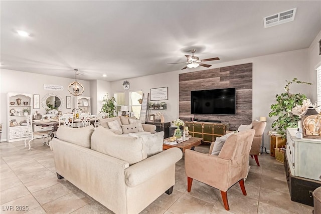living area with a ceiling fan