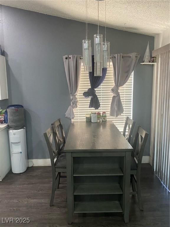 1841 Skywood Way, Las Vegas, NV 89142 - dining room with a textured ceiling and dark wood-style floors