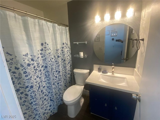 1841 Skywood Way, Las Vegas, NV 89142 - bathroom featuring vanity, toilet, and a shower with curtain
