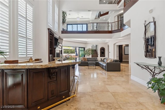 building lobby featuring a towering ceiling