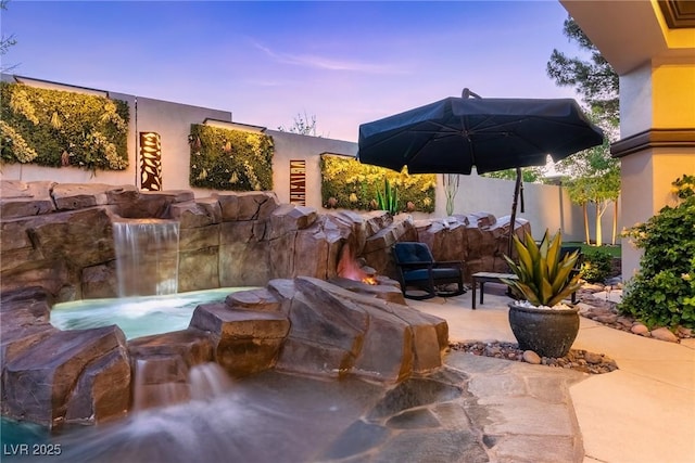 view of patio with fence