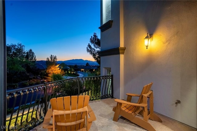 balcony featuring a mountain view