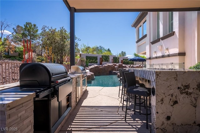 view of patio / terrace featuring area for grilling and grilling area