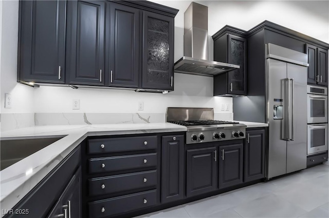 1316 Eagle Meadow Ct, Las Vegas, NV 89123 - kitchen with wall chimney exhaust hood, appliances with stainless steel finishes, and light stone counters